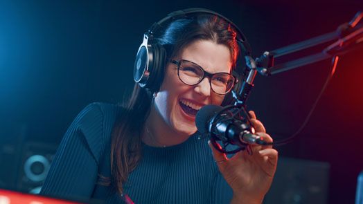 Cheerful woman hosting a radio show